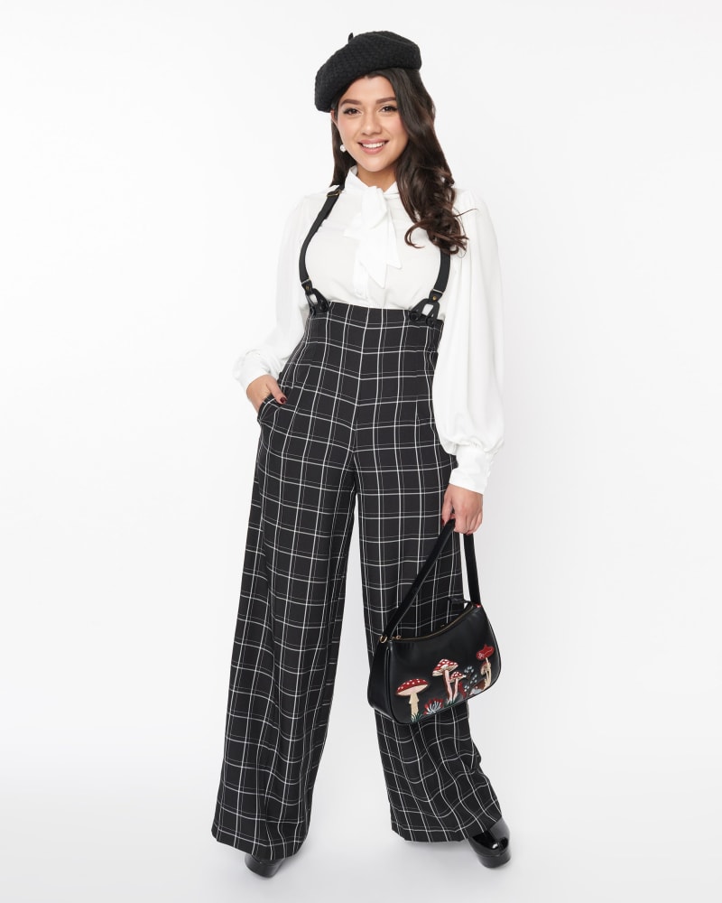 Front of a model wearing a size 4X Unique Vintage Black Windowpane Plaid High Waist Suspender Trouser in Black Plaid by Unique Vintage. | dia_product_style_image_id:316938